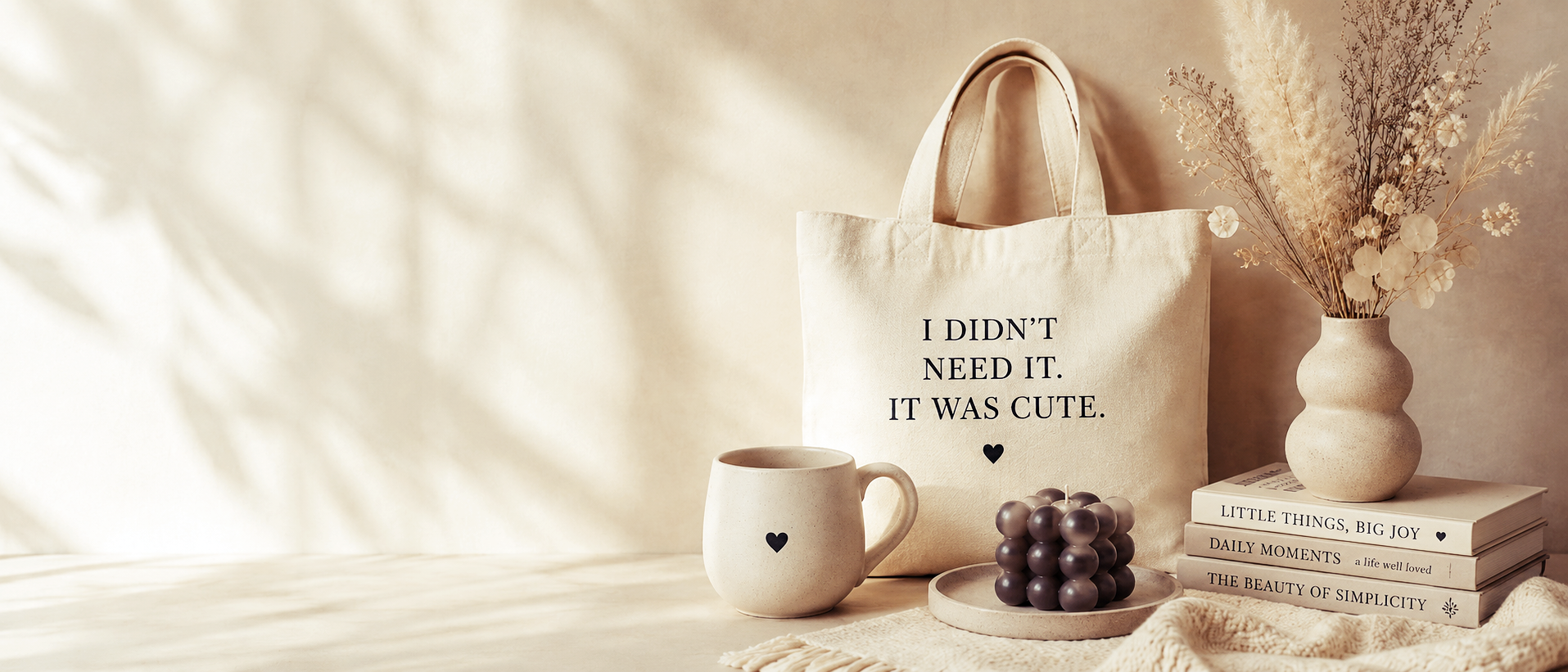 Cute neutral tote, mug, books and home decor